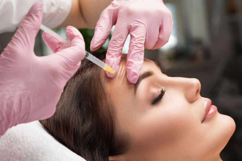 Woman getting Botox, jeauveau, daxxify, xeomin injection at Ever Medical Spa in Canton, MI